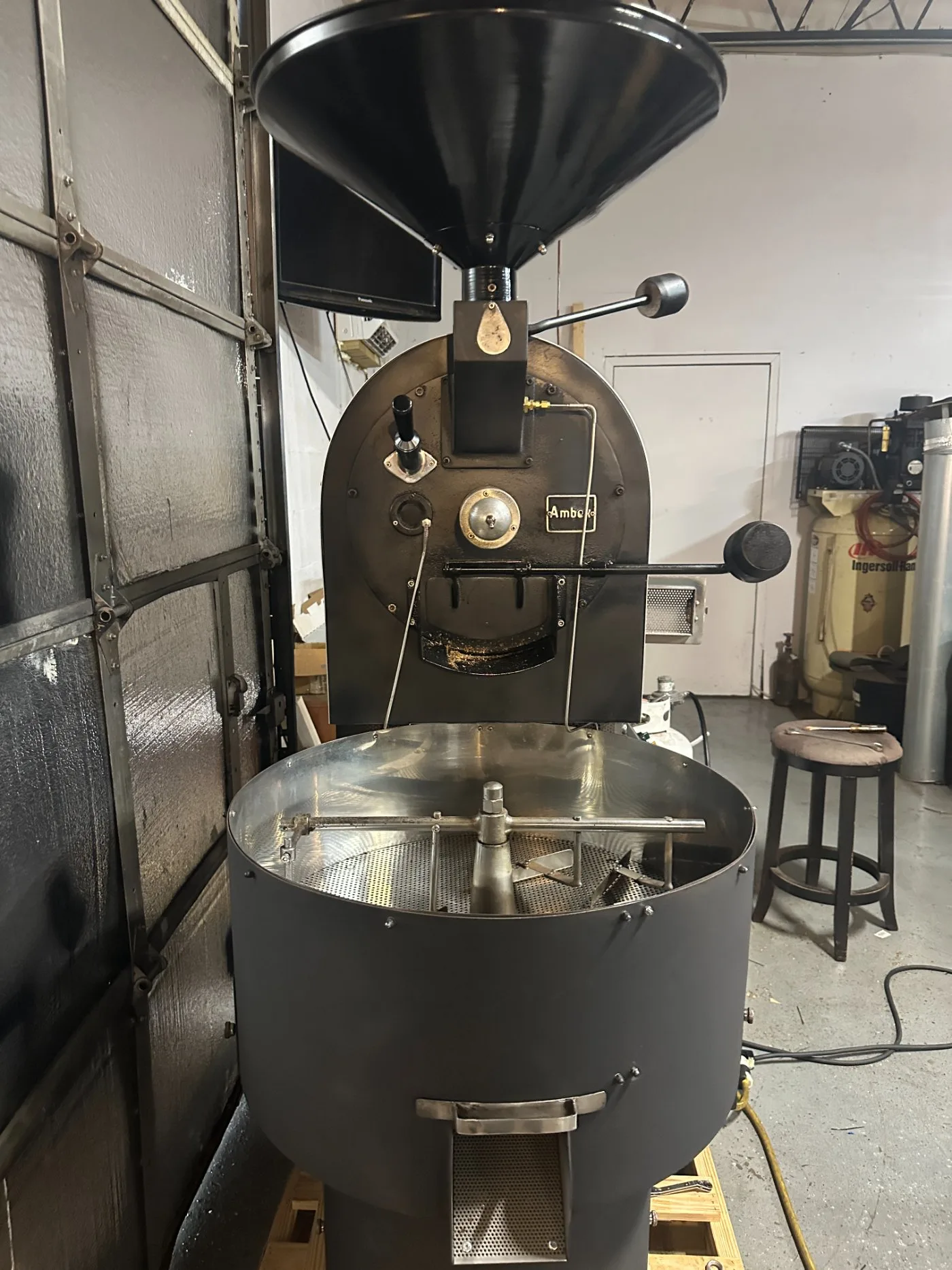 The boardwalk YM-15, rebuilt and refinished dark, in the Clearwater shop